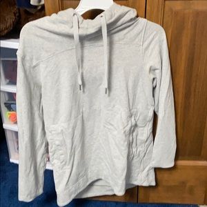 Gray hooded Lululemon sweatshirt